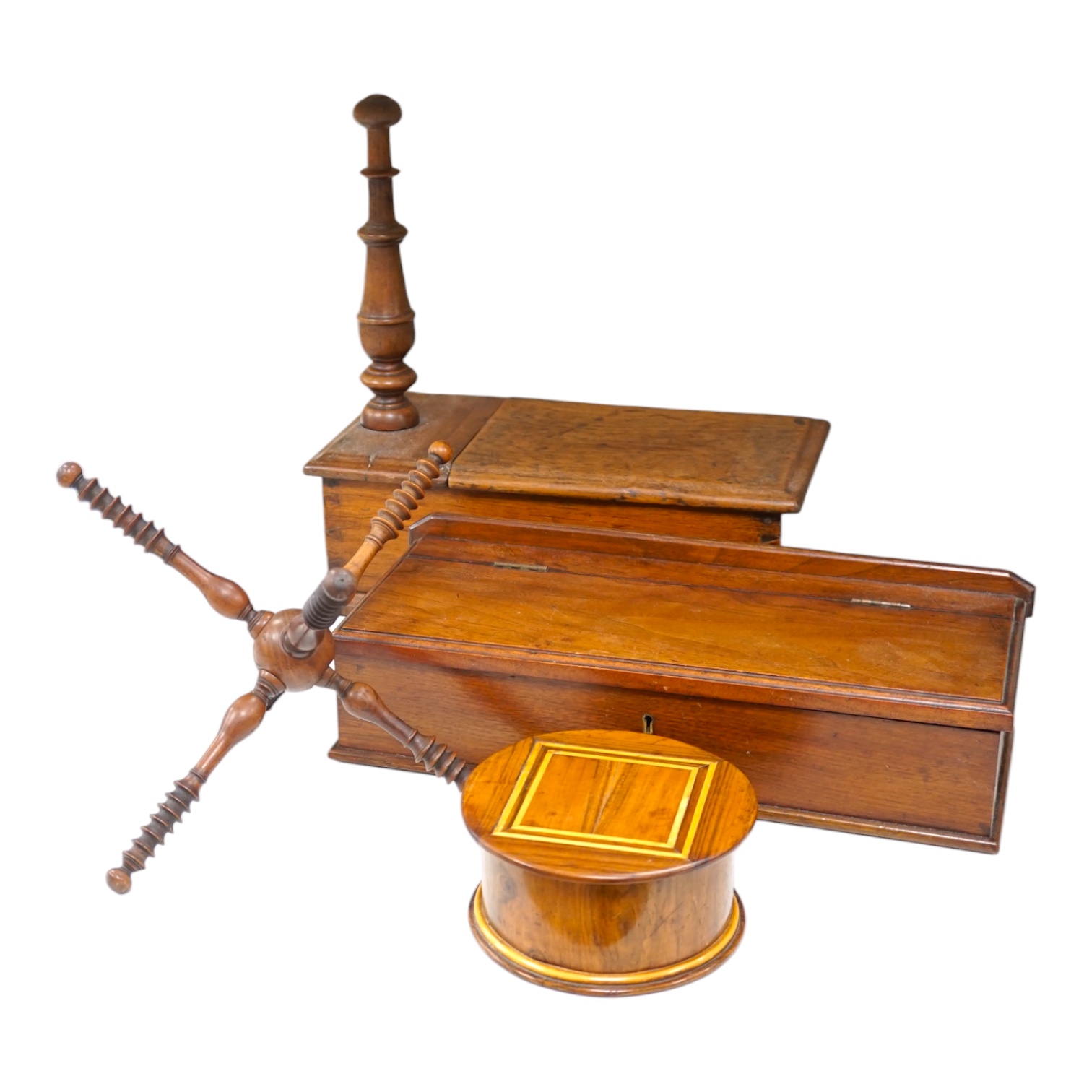 19th/early 20th century woodenware to include Pitcairn Islands circular box and treen ‘cat’ or plate stand, largest 44cm wide. Condition - fair to good